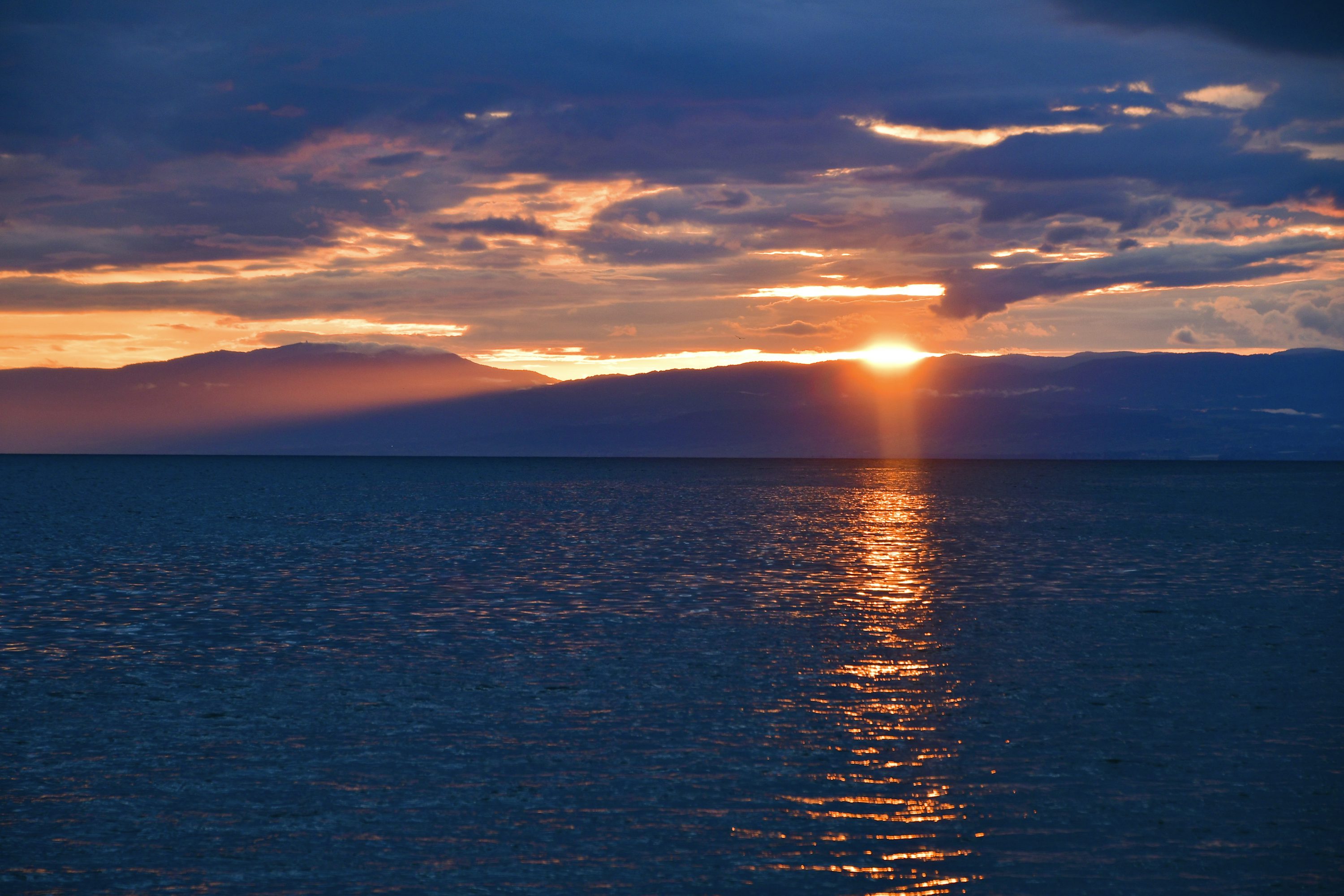Lake Geneva and the Swiss Alps at sunset